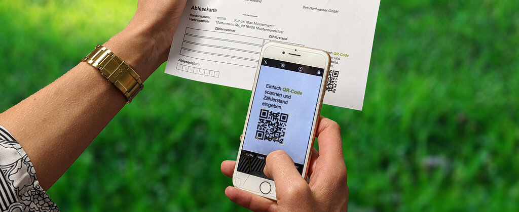 QR Code von Bescheid wird gescannt